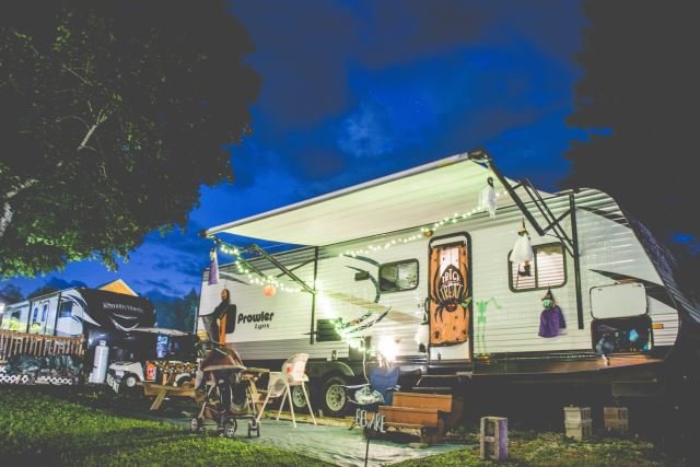 View of camp sites at night at Triple R Campground in Western NY