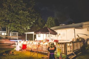 View of camp sites at night at Triple R Campground in Western NY