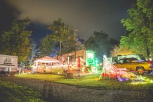 View of camp sites at night at Triple R Campground in Western NY