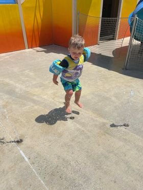 Kids playing in the LeeKee Lagoon at Triple R