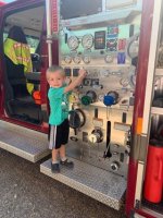 Kids hanging out on Fire Truck at Triple R