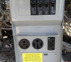 Picture of electrical box - 20/30/50 Amp connections with Breakers.