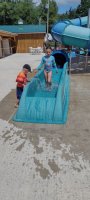 Kids playing in slides in the LeeKee Lagoon at Triple R