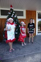 children at christmas tree