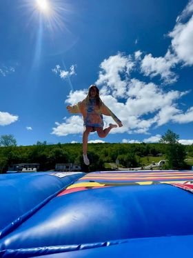 Kids jumping on Jumping pillow at Triple R