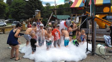 Kids playing with huge pile of bubbles at Triple R