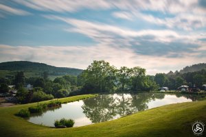 Pond with wild sky at Triple R