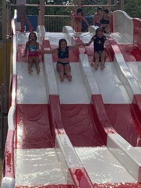 Kids playing in the LeeKee Lagoon at Triple R