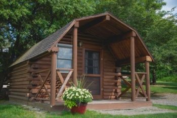 exterior of Rustic Cabin Site 625 & 626 at Triple R Camping Resort campground in wny