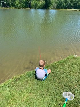 Kids fishing at the Triple R pond