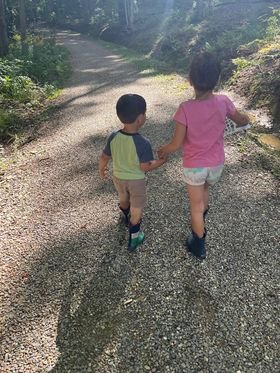 Kids hiking in the hiking trails at Triple R