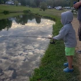 Kid fishing at Triple R pond