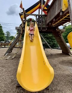 Kids playing on the playground at Triple R