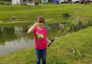 Camper Fishing Memorial Day Weekend at Triple R Campground in Western NY