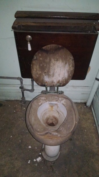 A filthy toilet in an RV