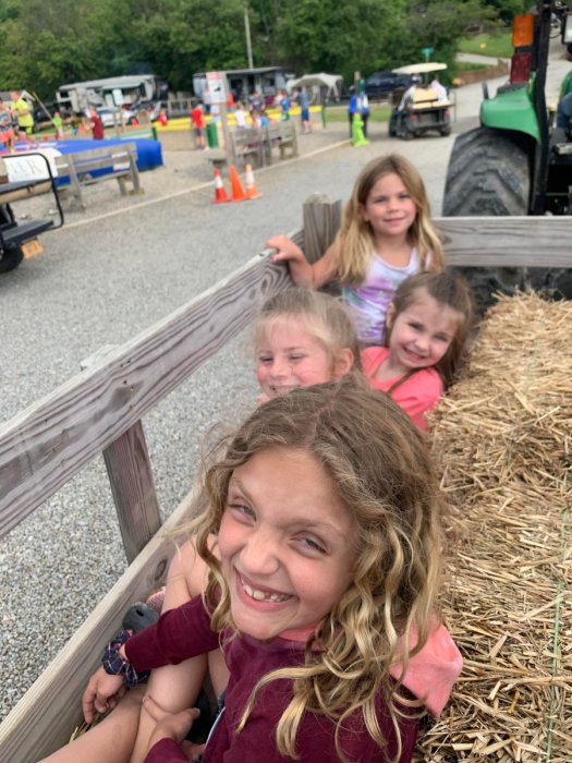 Kids on hay ride at Triple R